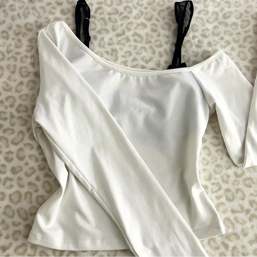 White asymmetrical long sleeve
